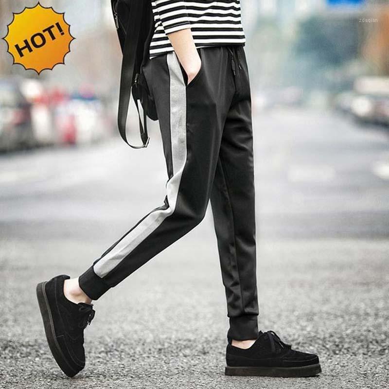 

HOT 2020 Summer binding off trousers foot trousers Hip hop men harem Side Strip youth movement leisure sweatpants1, Black