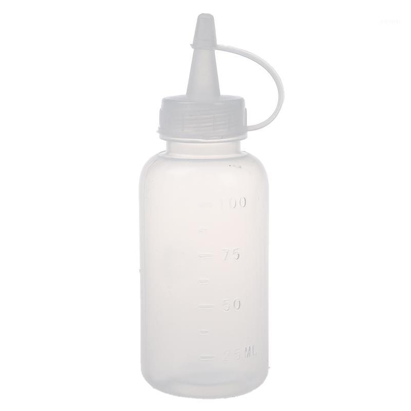 

Clear squeezable 100 ml flask, white cover dispenser (10 bottles)1