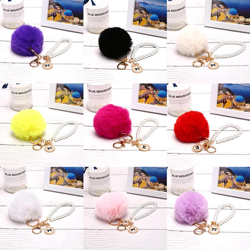 

Pompon Keychain Simple key chain Fur ball Pompom Artificial Fur Animal Keychains For Woman Car Bag KeyRing 9 colors