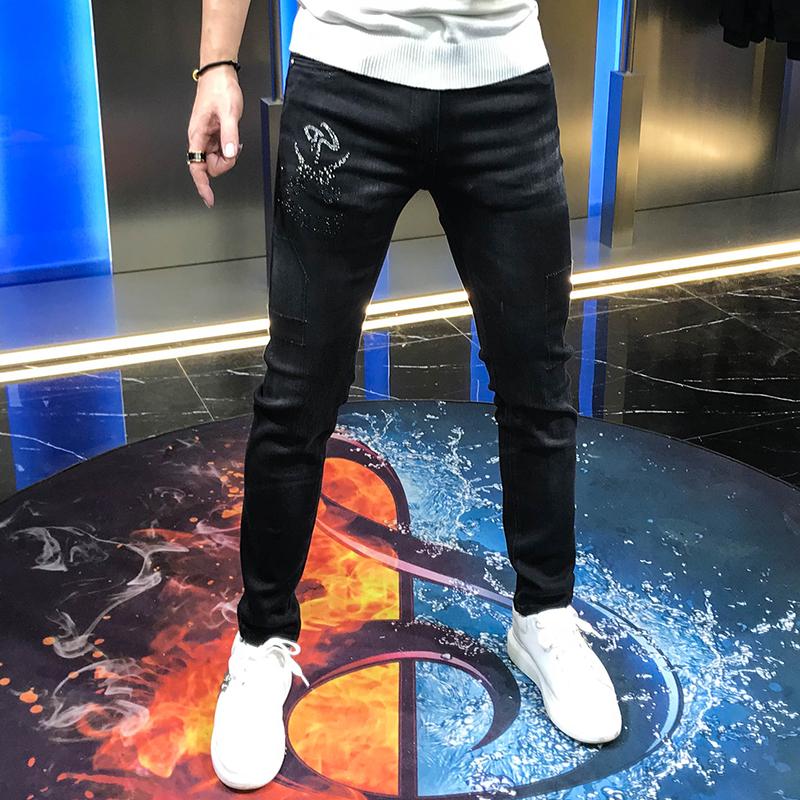 

Fashionable men jeans 2020 stretch letter ironing and drilling slim fit autumn new black handsome casual small foot trousers men