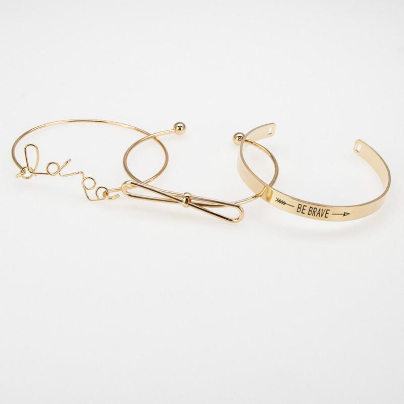 

New hand ornament fashion simple bowknot brave letter open Bracelet Set