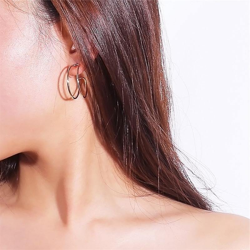 

Hollow Geometric Curved Hoop Earrings for Women Simple Design Snail Women Earrings ET052