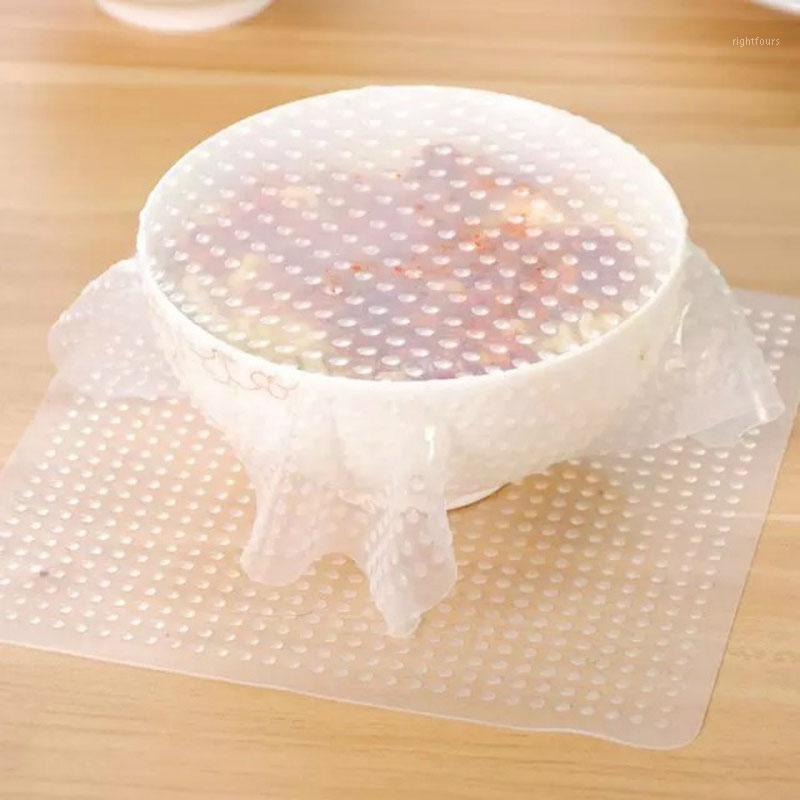 

Multifunctional Reusable Silicone Wraps Seal Cover Stretch Fresh Keeping Saran Wrap Storage Container Vacuum Lid1