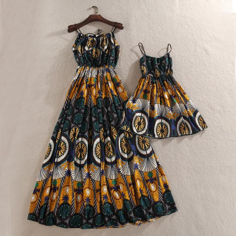 

Mama Mother Daughter Dress 2020 Summer girls Beach clothing flower Print Bohemia Style for Mom Daughter Family Matching Outfits1
