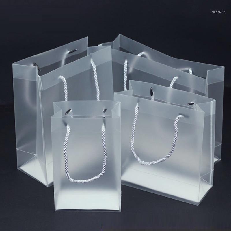 

10pcs- Frosted PP Plastic Gift Packaging Bags With Handle Clear Handbag Wedding Party Favors Bag1