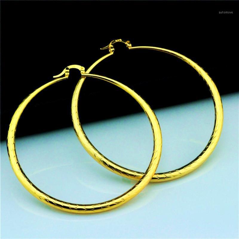 

New gold color woman earrings Personality charm female earrings Unique design exaggerated1