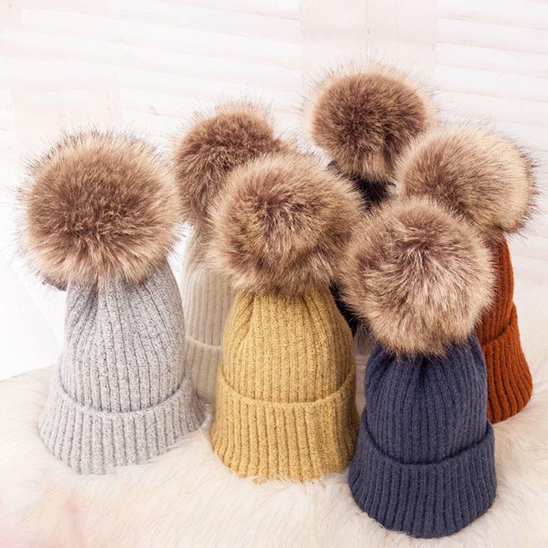 

Winter new thickening warm dark buckle hair ball head men and women wool caps mixed color knit hat tide