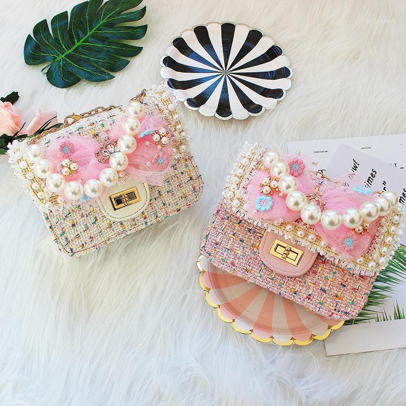

Children's Mini Bow Handbags Tote Cute Pearl Crossbody Bags for Women Small Coin Wallet Pouch Kids Girls Princess Party Purse1, Beige