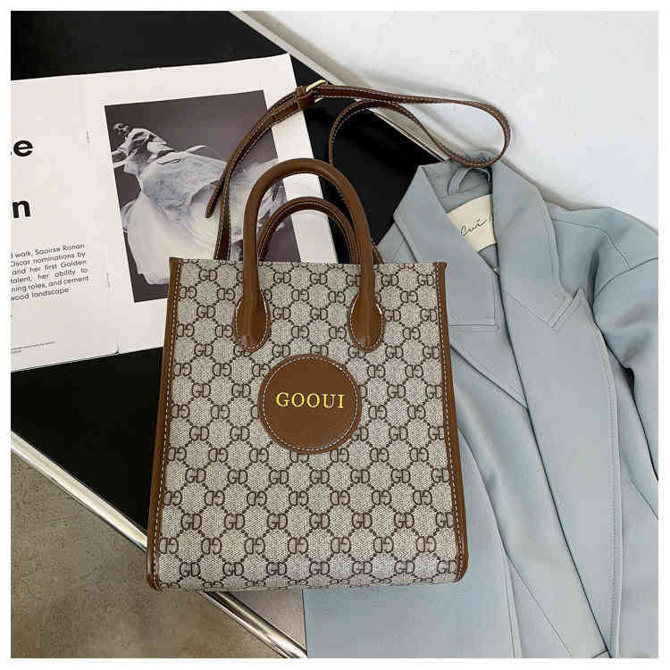 

Large capacity piano music bag with foreign atmosphere and simple one shoulder cross carry lady's Handbags Top, Brown