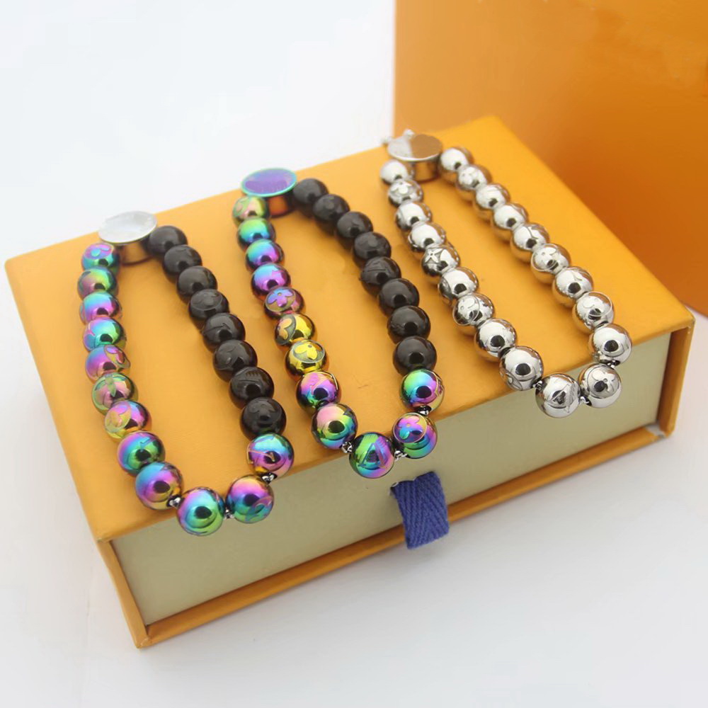 

Hot Sale Fashion Style Men Lady Pull-type Colored Steel Ball V Letter Carved Flower Round Beads Chain Bracelets 3 Color
