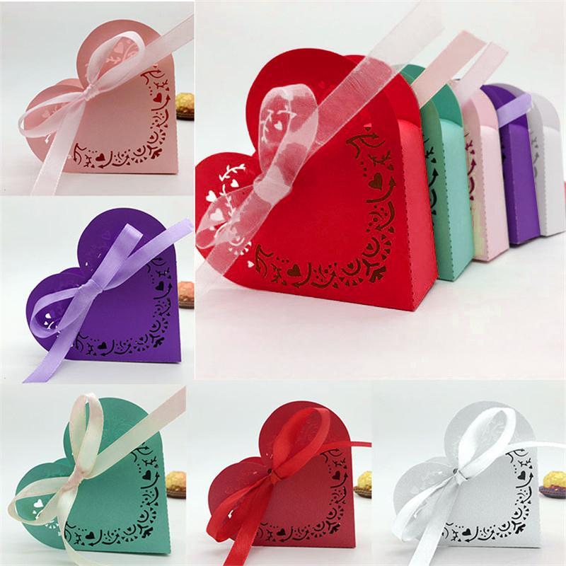 

50pcs Laser Cut Heart Wedding Candy Boxes Gift Box with Ribbon Birthday Sweet Bag Wedding Favors box For Guest Party Supplies 8Z1
