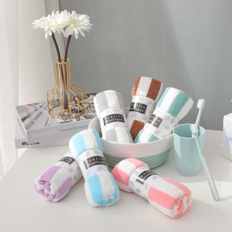 

Simple and fresh fleece warp knitted cationic coral fleece vertical bar dry hair coral towel