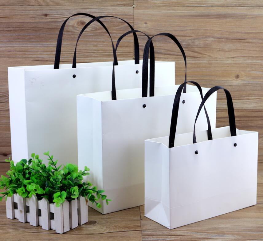

25x9x17cm 20pieces/Pack business gift black paper bag with handle for clothes shoes shopping