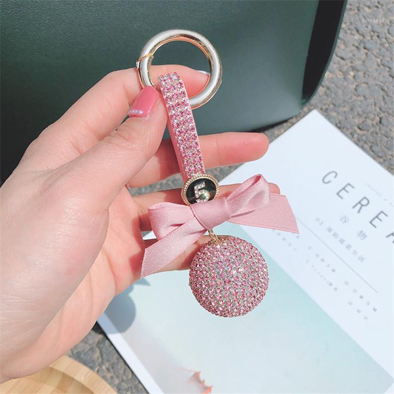 

Keychains Elegant Cute Rhinestone Crystal Ball Keychain Leather Strap Bowknot Car Key Chain Bag Charm Pendant Holder Jewelry Llavero1