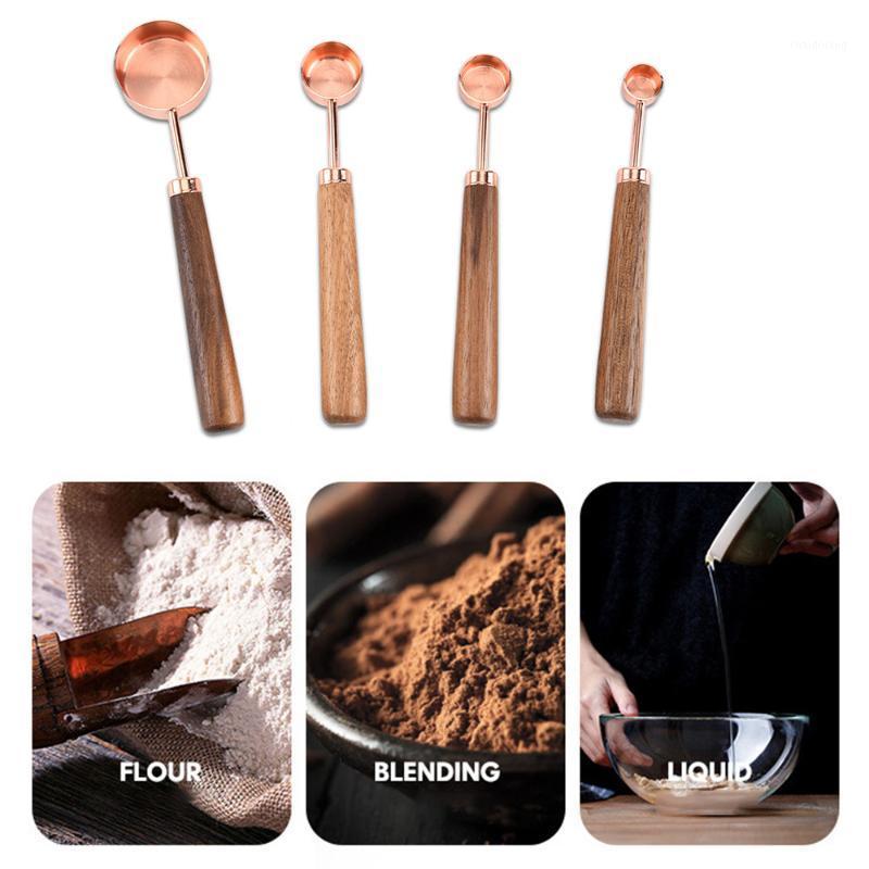 

4 pcs/ Set Wooden Handle Stainless Steel Copper Plated Baking Tool Rose Gold Measuring Spoon with Scale with Thickened1