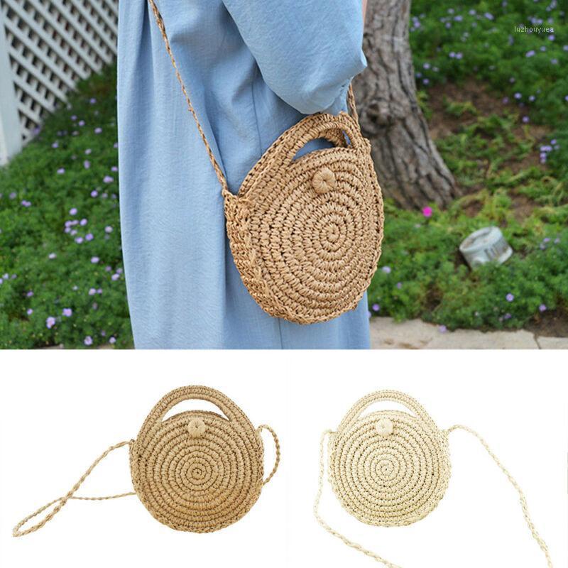 

Women Retro Beach Straw Bag Rattan Woven Round Handbag Messenger Shoulder Bag1