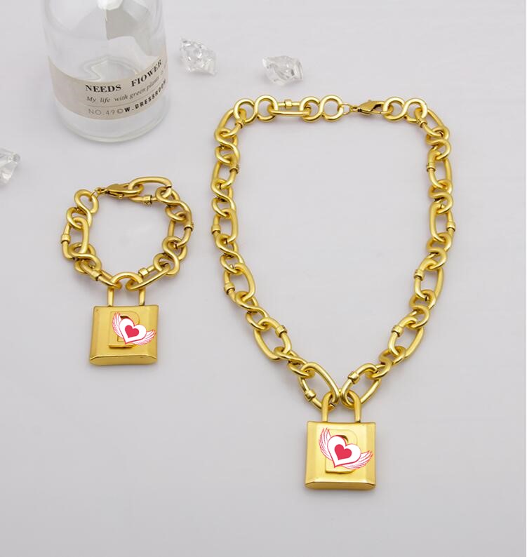 

Hot sale women's vintage old golden letter lock pendant necklace clavicle chain thick chain bracelet fast delivery