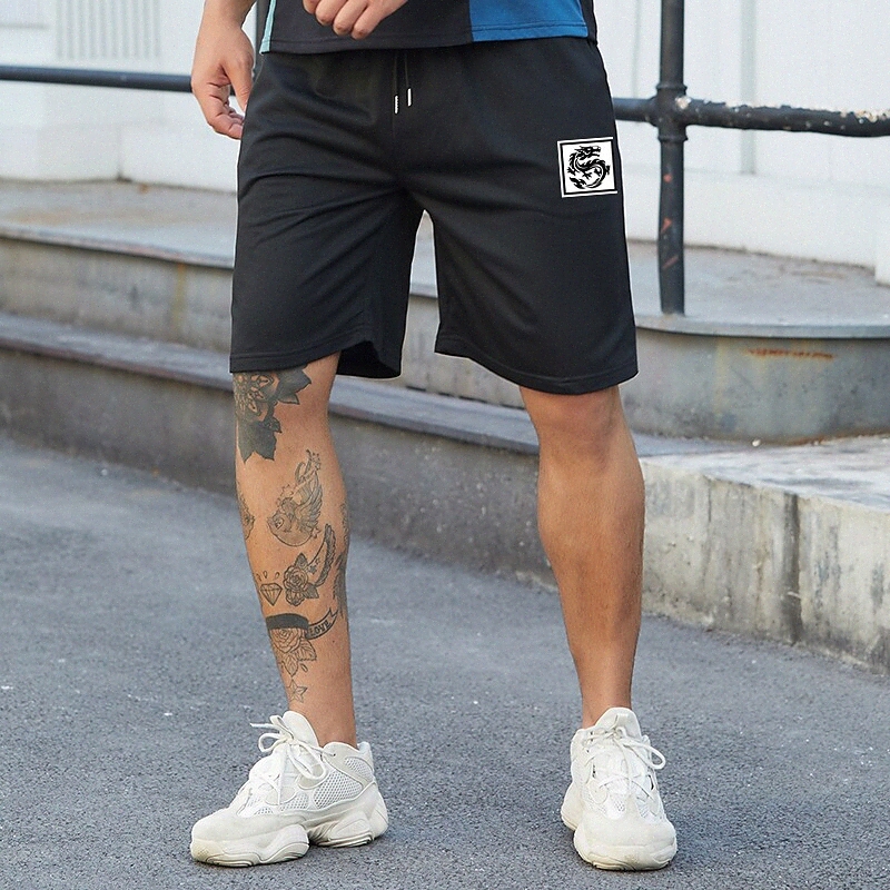 Streetwear Streetwear Casual / sportif pour hommes Bermuda Shorts de cordon de cordon de cuisson à la taille élastique au-dessus du genou pantalo