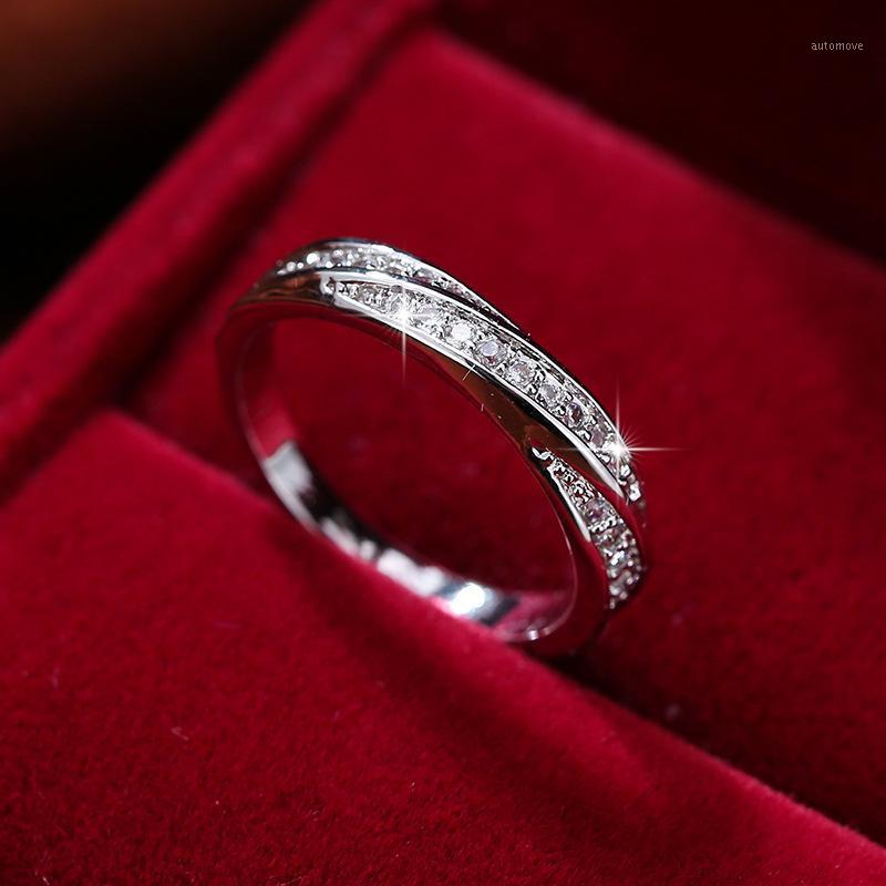 

Luxury Female White Crystal Stone Ring Cute Silver Color Color Wedding Rings For Women Classic Bridal Cross Engagement Ring1