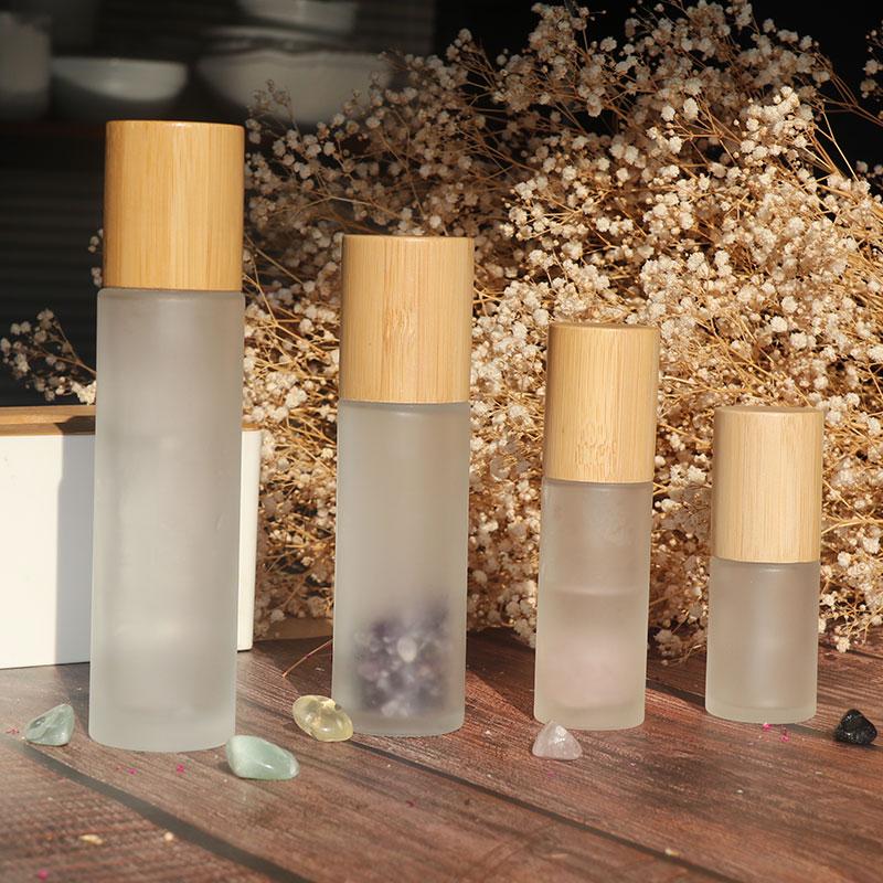 

oil 1oz cosmetic bamboo lotion glass bottle packaging serum bottle with bamboo pump caps, perfume bottles 150ml 100ml
