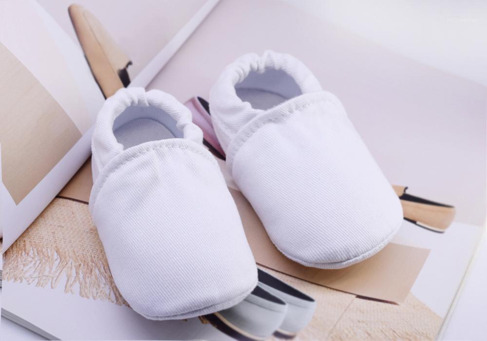 

Newborns baby shoes White cotton Infant Boys First Walkers Soft Toddler Shoes Cute Crib Footwear for Kid Girls1