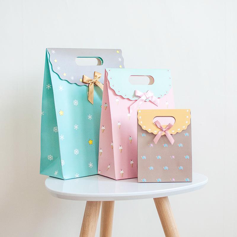 

5PCS Sweet Gift Bag Self-adhesive Bowknot Simple Paper Box Christmas Birthday Cartoon Little Candy Chocolate New Year Bag1