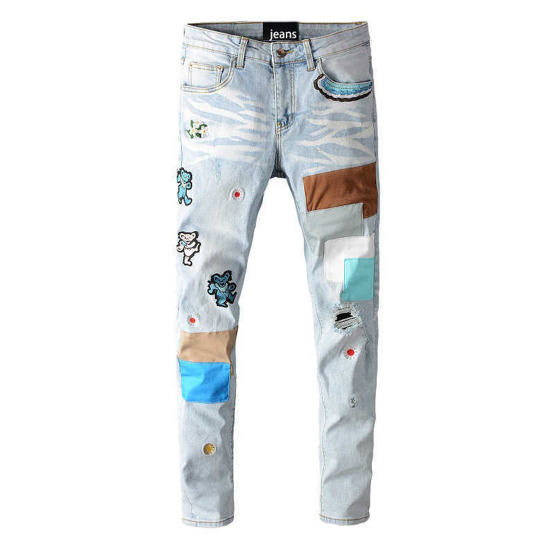 

Trend Amirs light blue patch hole elastic tight legged jeans