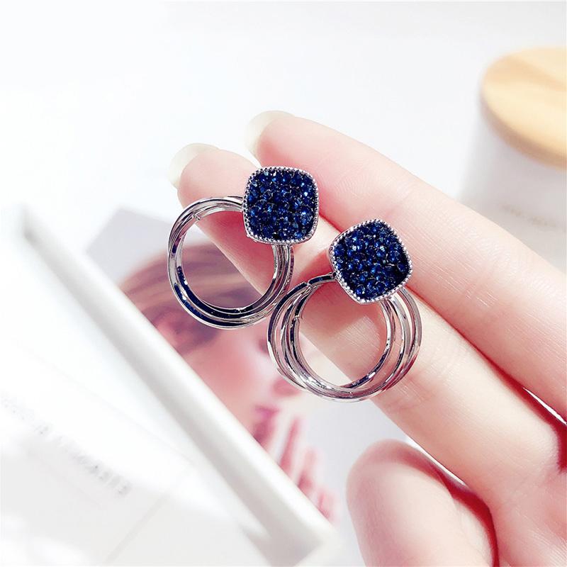 

AENSOA Trendy Blue Crystal Small Round Drop Earrings Cute Metal Blue Color Shiny Rhinestone Geometric Round Earrings for Women