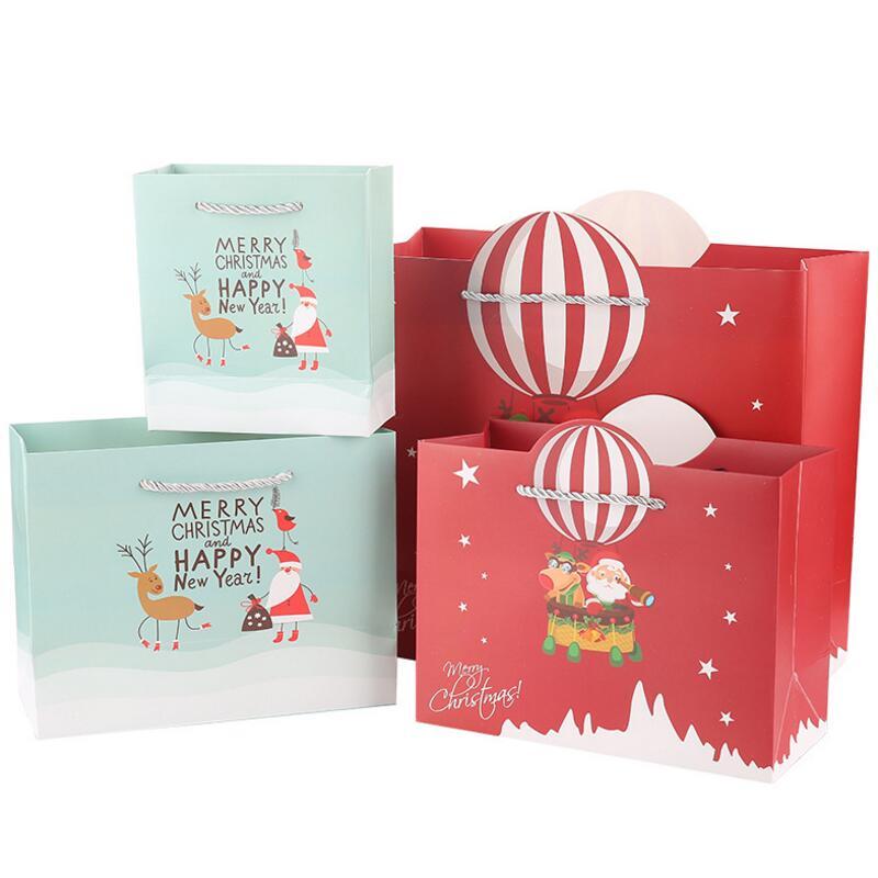 

10pcs/lot High Quality Hand Bag Christmas Hard Paper Candy Gift Bags with Handle Happy New Year Party Gift Package Bags