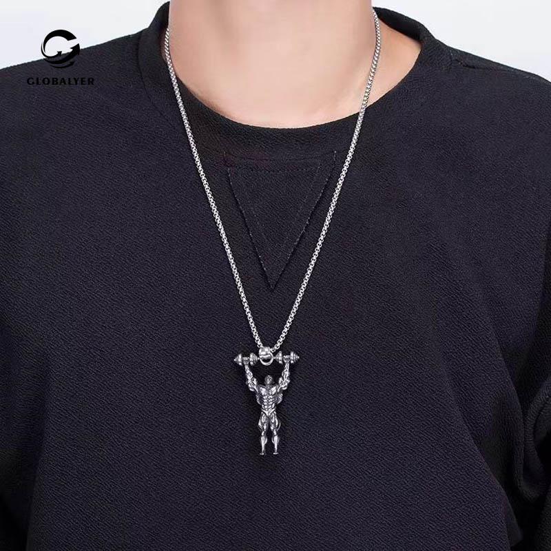 

European and American Hiphop jewelry Muscle man necklace Titanium steel men's ghost face muscle seal necklace Free shipping 2981