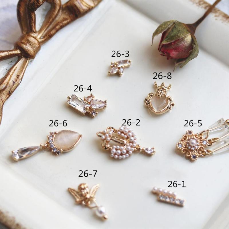 

10pcs Cat's eye cross Love Crystal pearl Zircon Nail Art Rhinestone metal manicure nails accessories DIY Nail Decorations charms