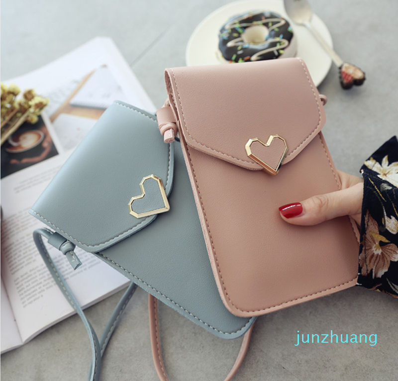 

Designer- Female Student Decoration Touchable Mobile Phone Bag Women's Heart Shaped Buckle Bag Simple Retro Leather Bag
