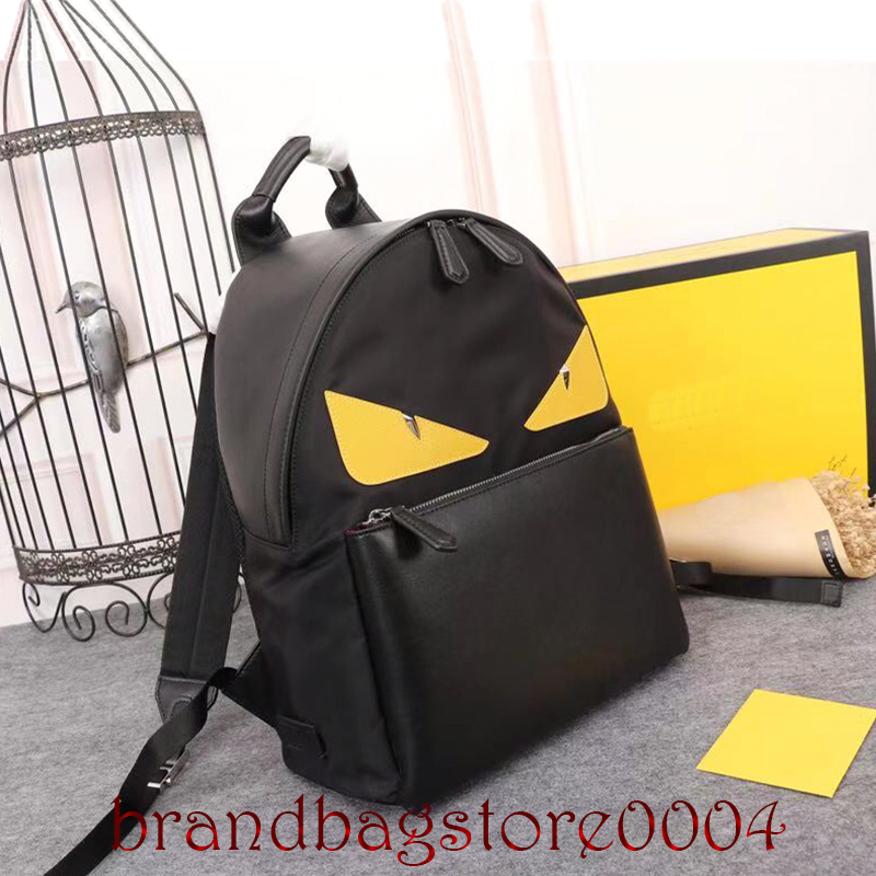 

2021 high quality waterproof Outdoor Packs female fashion black canvas ladies unisex bag imported leather backpack yellow eyes