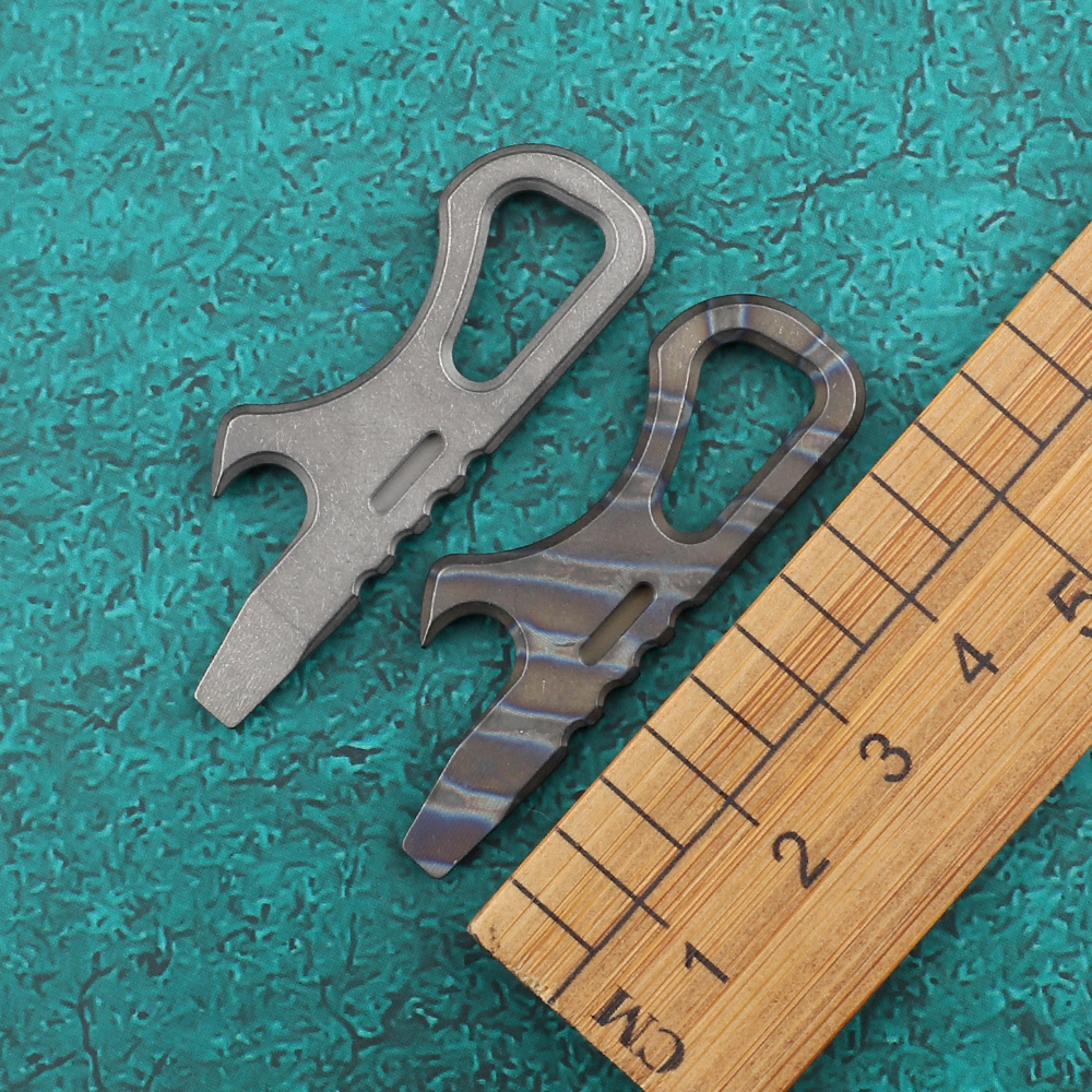 

Titanium alloy small monster multifunctional camping screwdriver bottle opener EDC tool