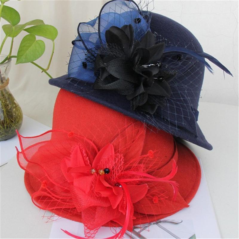 

Dome Woolen Small Brim Top Hat Female Autumn And Winter English Feather Net Yarn Fsherman Hat1