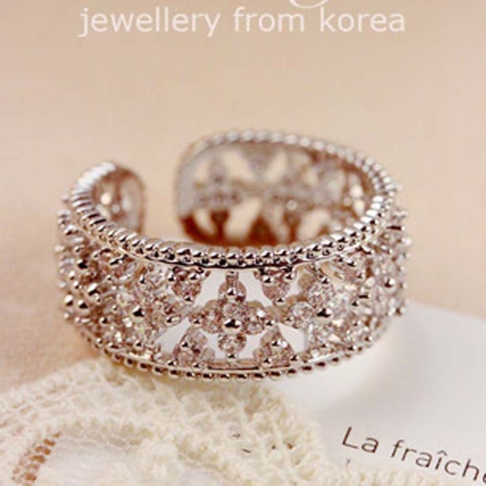 

Luxurys Designers Fashion Jz026 Korean fashion micro inlaid hollow out zircon clover Diamond Fashion Women's ring