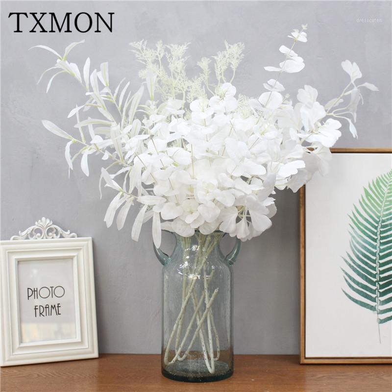 

Simulation green plants fake leaves olive eucalyptus money leaf white wedding decoration plastic tree branch flower arrangement1