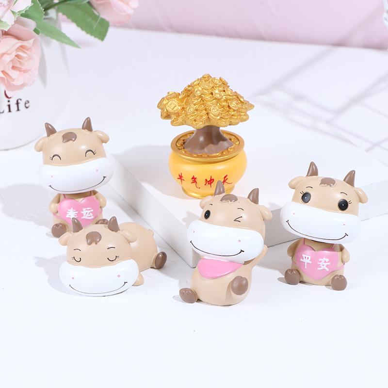 

New Creative Chinese OX Car Ornaments Year Of The Ox Shaking His Head Resin Ornaments Cow Lucky Safe Car