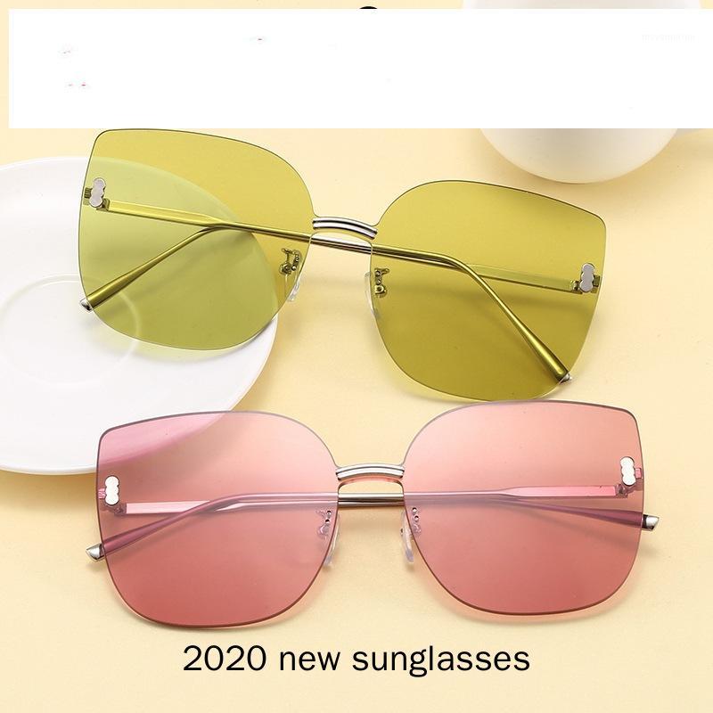 

2020 Luxury Retro Frameless Sunglasses Women Cat Glasses Women Vintage Eyeglasses for Women/Men Mirror with Box NX1