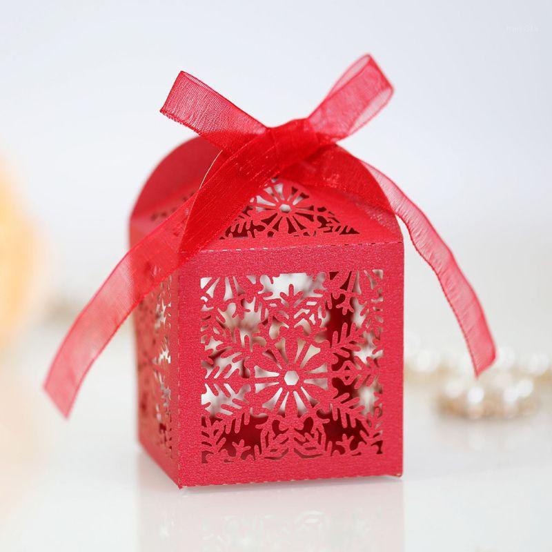 

50pcs Christmas Snowflake Hollow Favor Gift Candy Box with Ribbon Wedding Party1