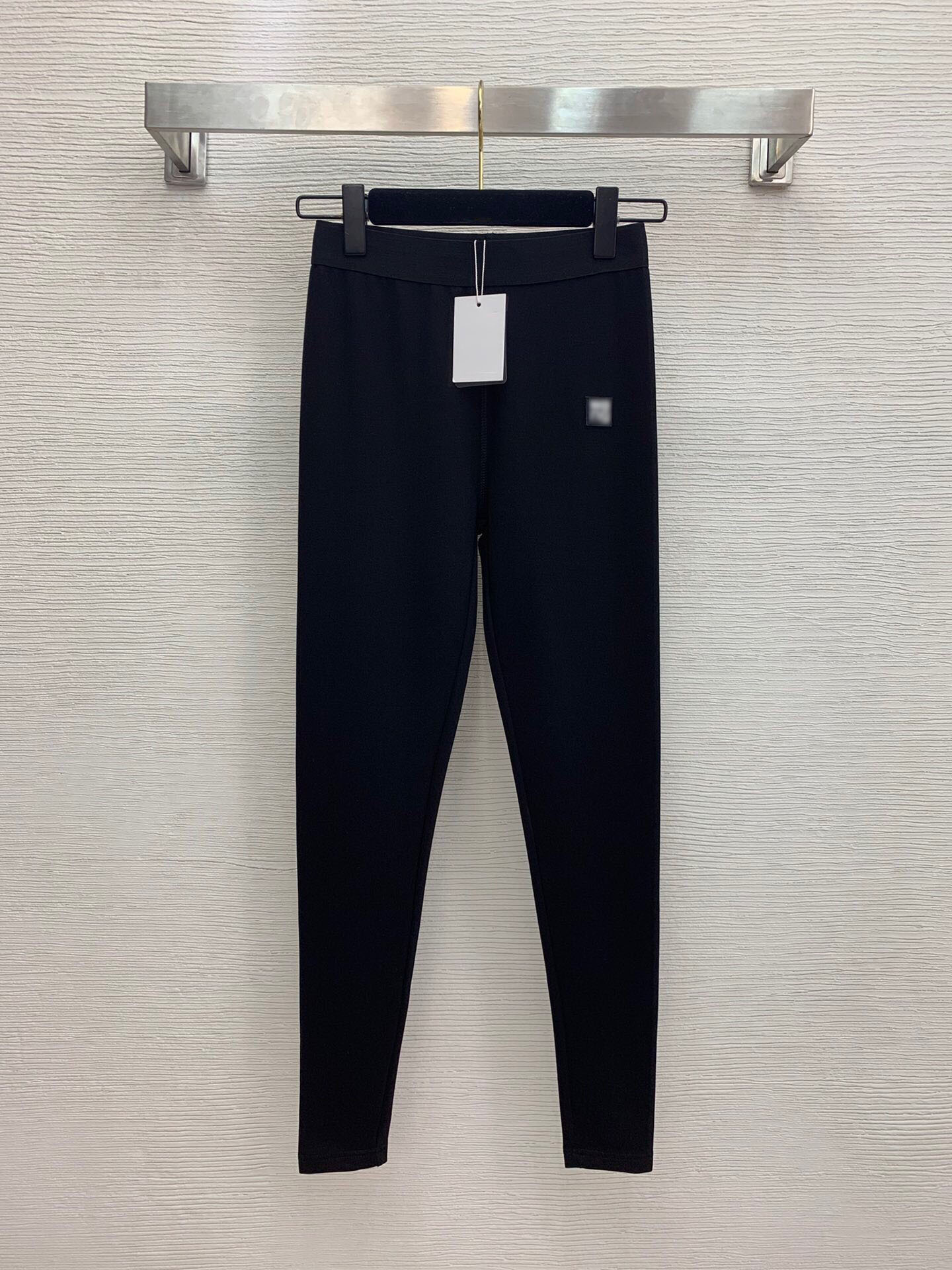 

2020 high end rubber stamp badge with lettered print design at the bottom of trousers, Black