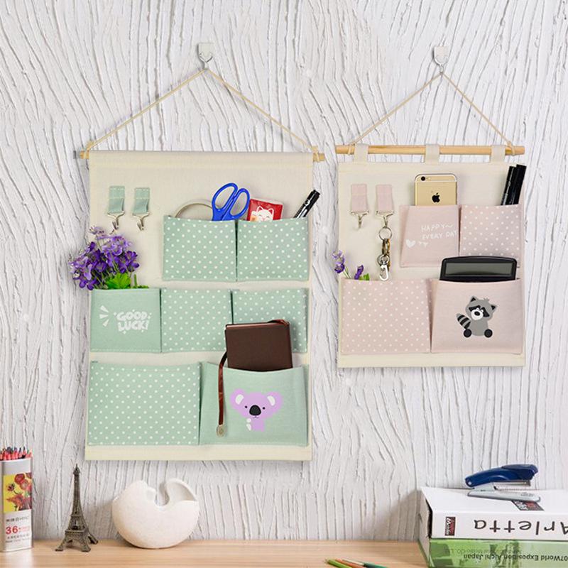 

Cartoon Canvas Hanging Storage Bag 7 Pockets Wall Mounted Wardrobe Hang Bag Wall Pouch Cosmetic Toys Organiz L05
