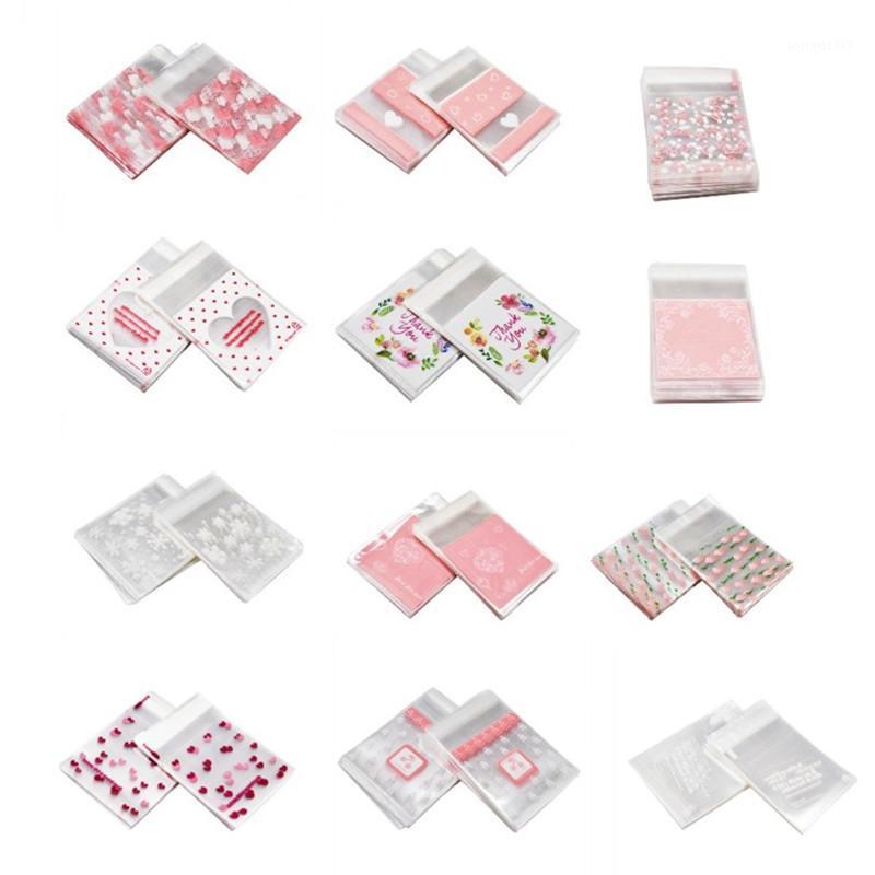 

50Pcs/100pcs Flowers Heart Cellophane OPP Bags Wedding Favors Gift Bag Self Adhesive Plastic Bag Baking Package Party Supplies1