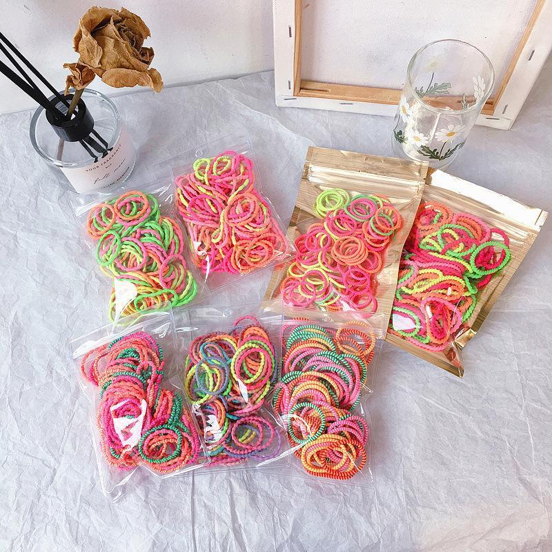 

2020 Sweet Cute Simple 100 Pcs/Set Fluorescent Color Thumb Circle Spiral Hair Rope for Girl Fashion Children's Hair Accessories1