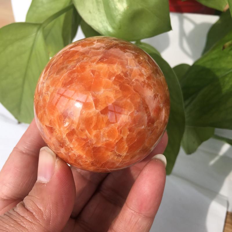 

Natural sunstone ball crystal ball polishing healing energy stone decoration
