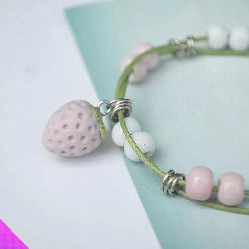 

Wholesale 10 pcs 2021 new strawberry ceramic bracelet sweet and romantic girl wax rope bracelet gift factory direct sales