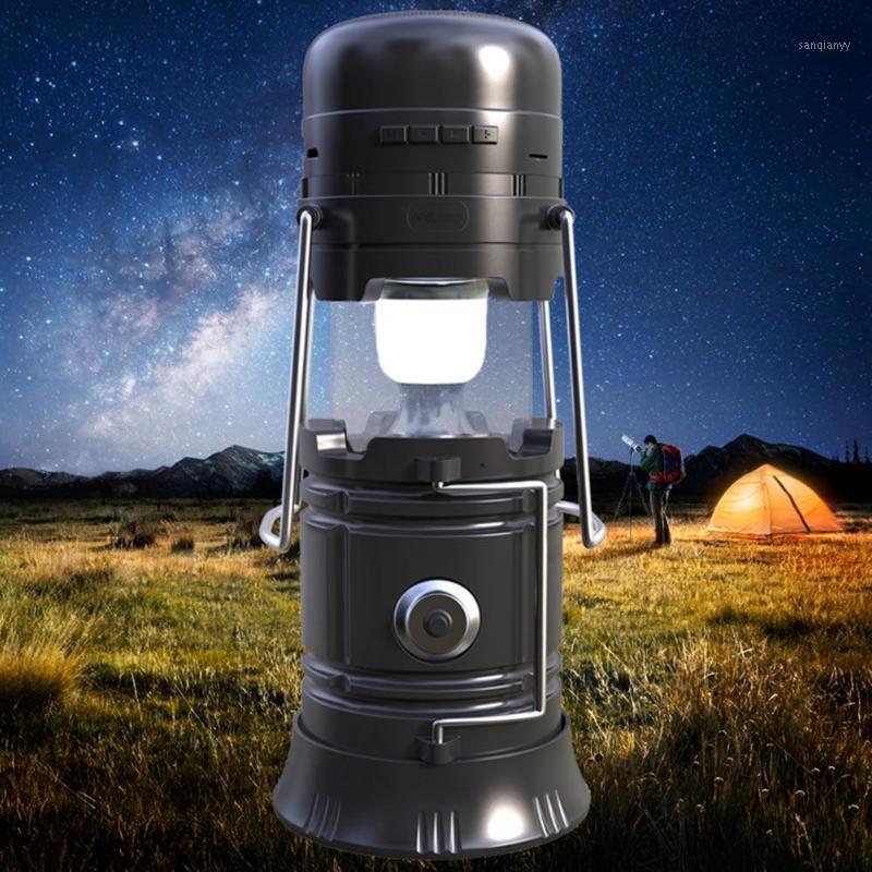 

Camping Lamp DC 5V 5W Multifunction Wireless Bluetooth Speaker FM Power Bank Solar Power Energy Torch Outdoor Portable Lanterns1