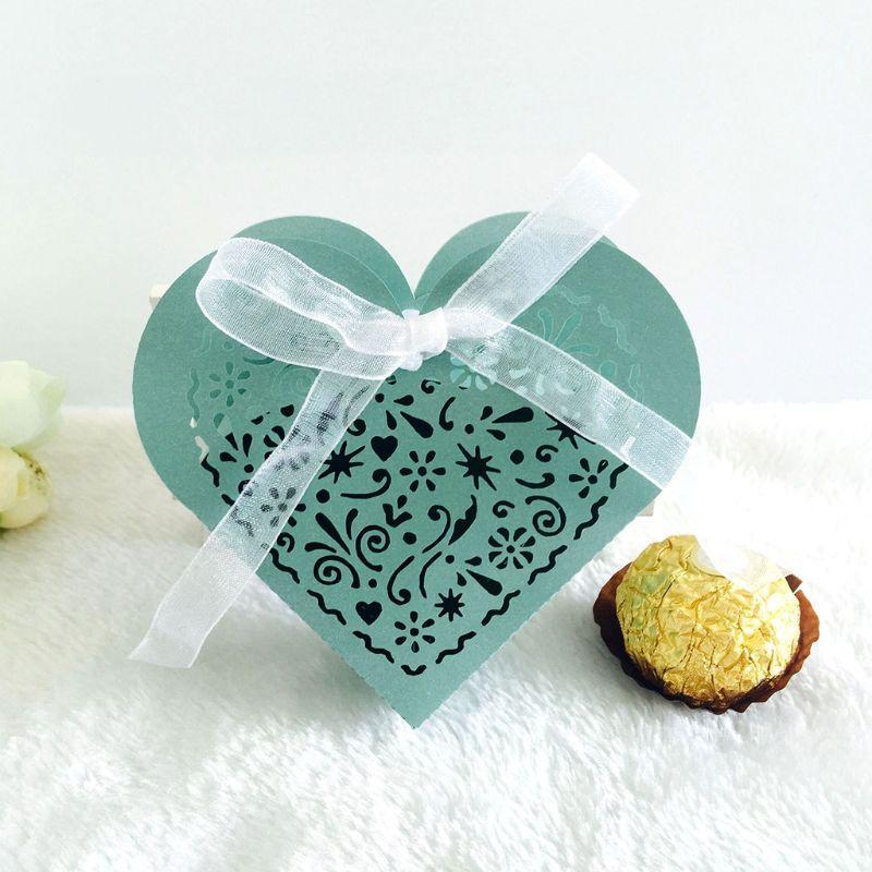 

50pcs/set Heart Shape Laser Cut Hollow Favors Gifts Candy Box with Ribbon Baby Shower Wedding Party Supplies E65B1