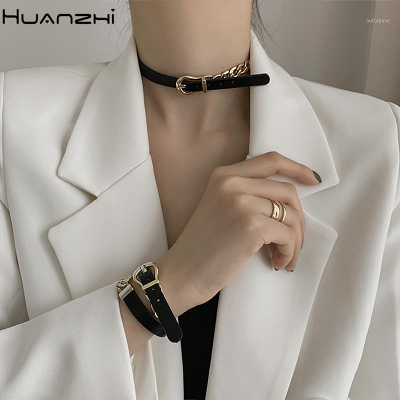 

HUANZHI 2020 New Punk Design Black Leather Metal Chain Splicing Choker Belt Buckle Necklace for Women Party Jewelry1