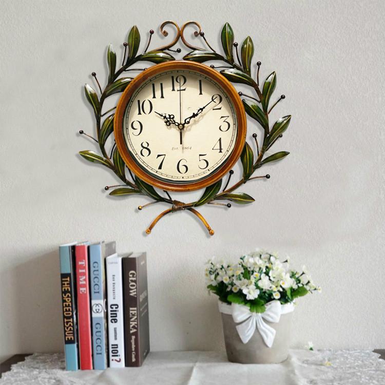 

Wholesale European-Style Iron Olive Branch Hanging Clock Fashion Pastoral Mute Hanging Clock Watch Factory Direct Sales